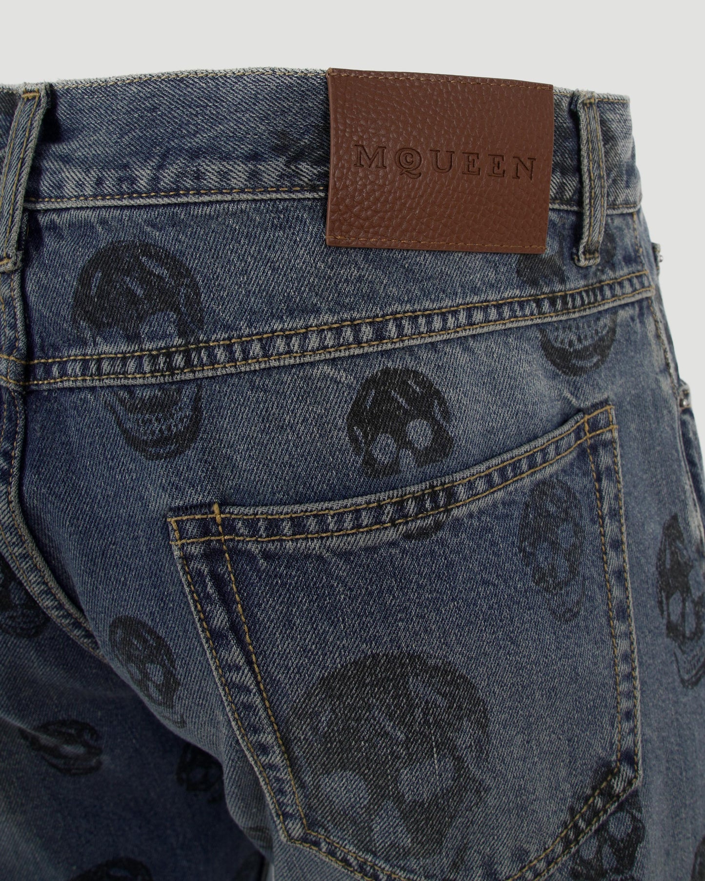 Washed Blue Jeans With Skull Motif