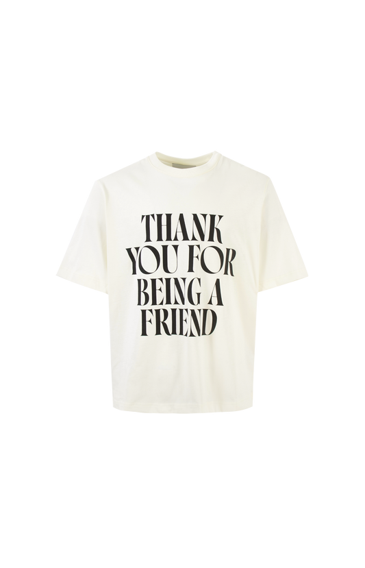 White t-shirt with 'THANK YOU FOR BEING A FRIEND' text on a white background