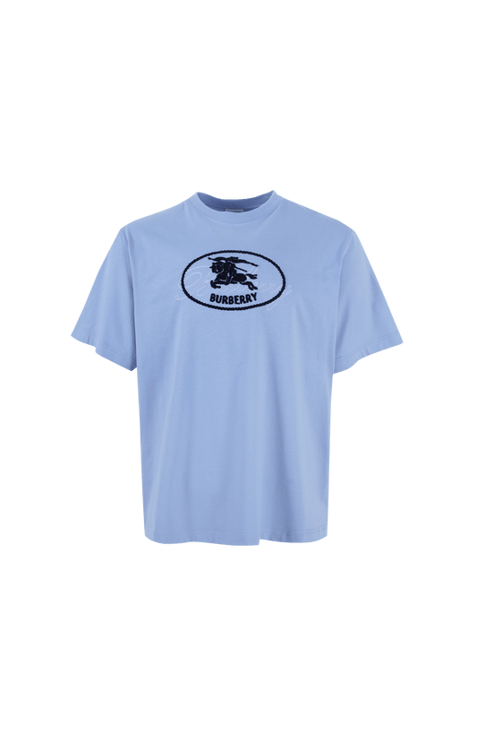Light blue t-shirt with Burberry logo on a black background