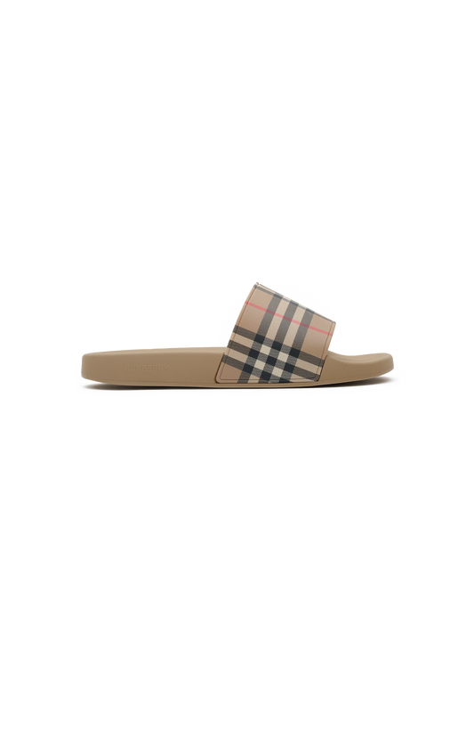 Tan slide sandal with check pattern on a white background