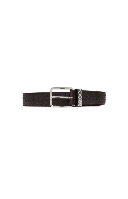 Black belt with a silver buckle on a white background