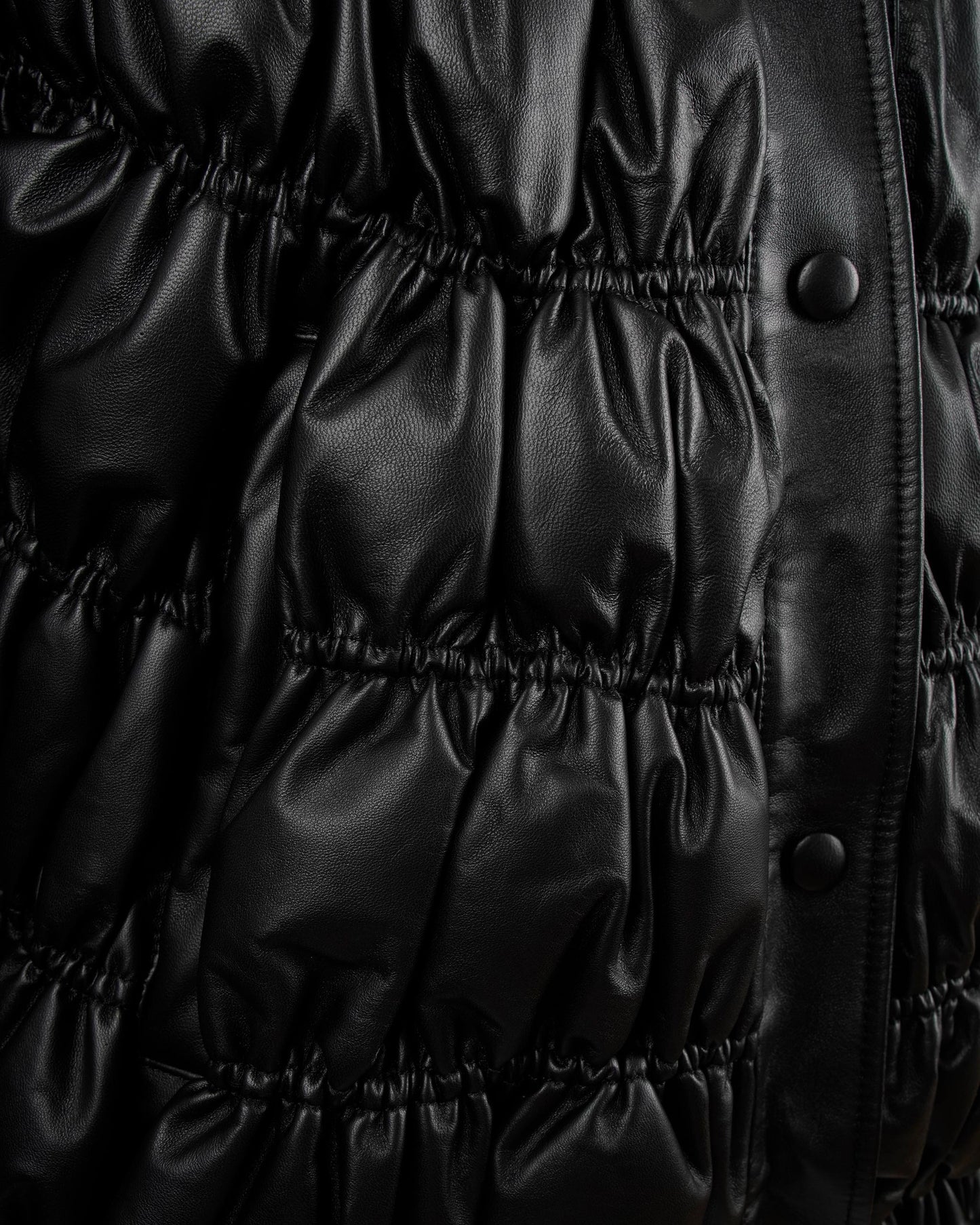 Quilted leather down jacket in black