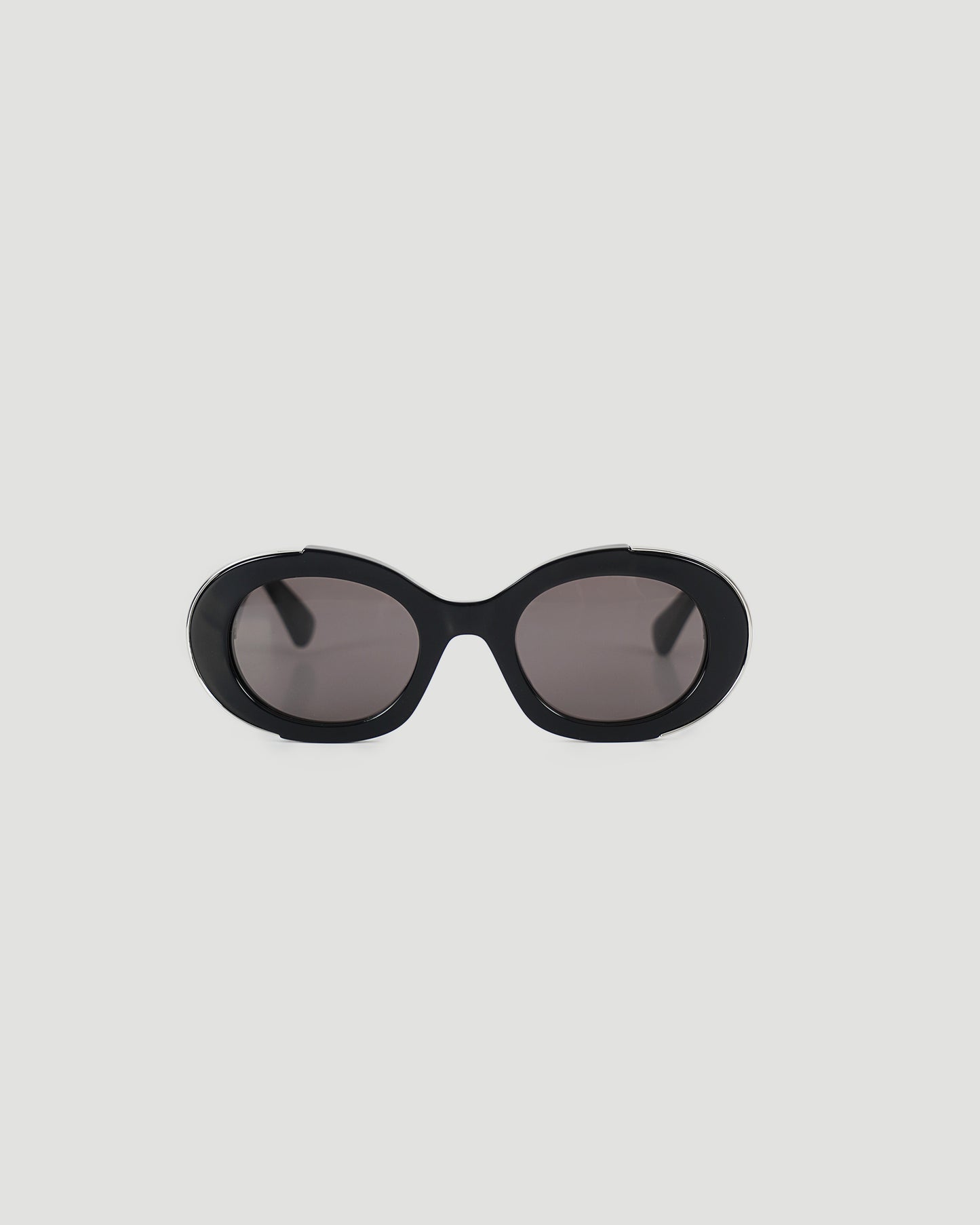The Grip Oval Sunglasses in Black