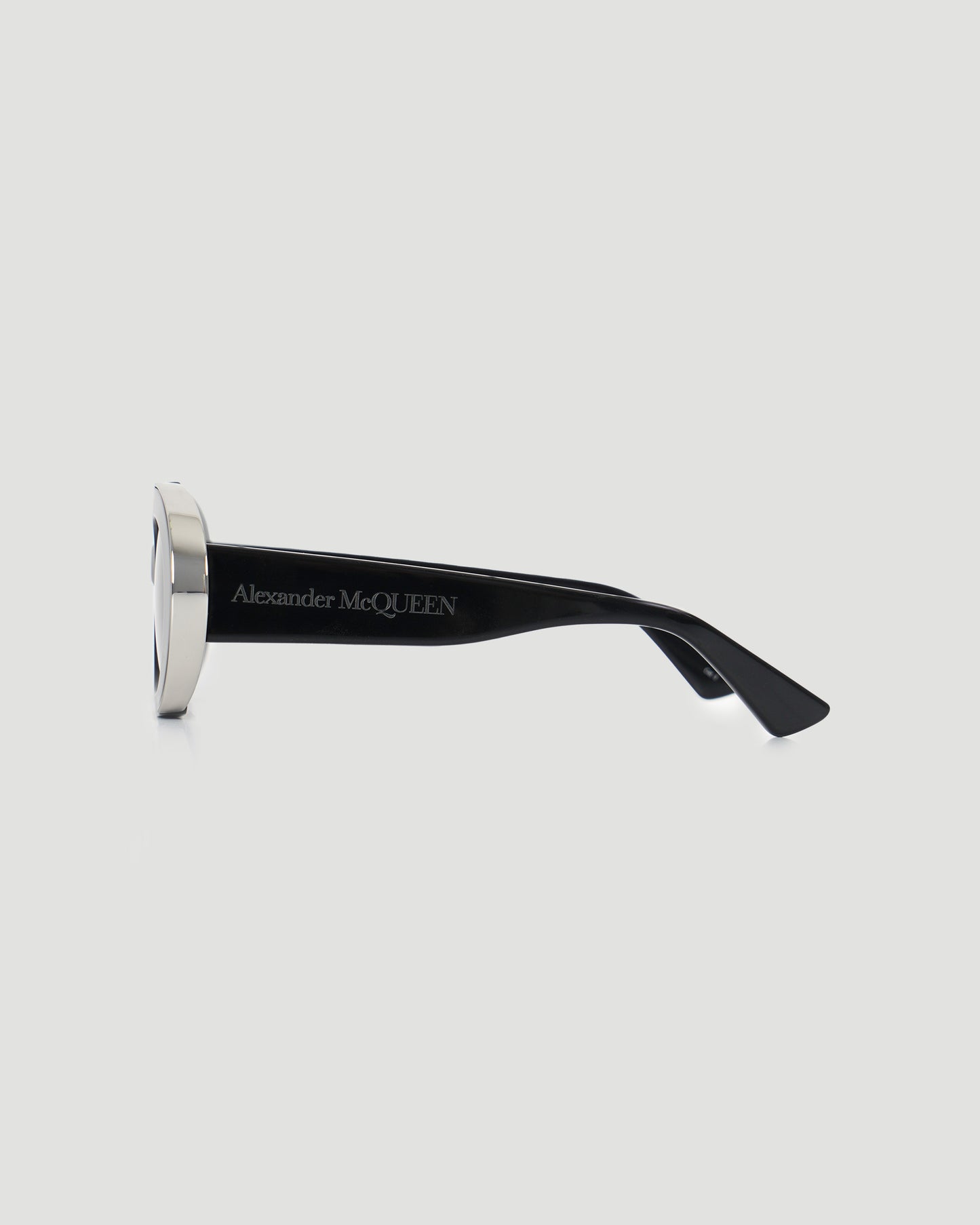 The Grip Oval Sunglasses in Black