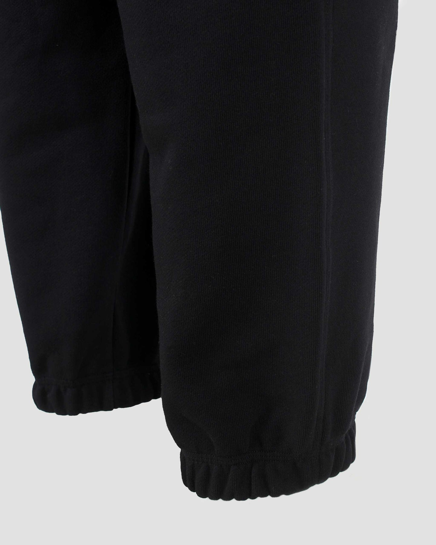 Check-Logo Patch Cotton Track Pants in Black