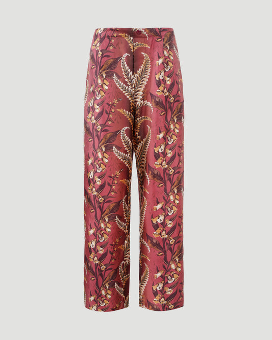 SILK PANTS WITH FLORAL MOTIF IN BRICK RED