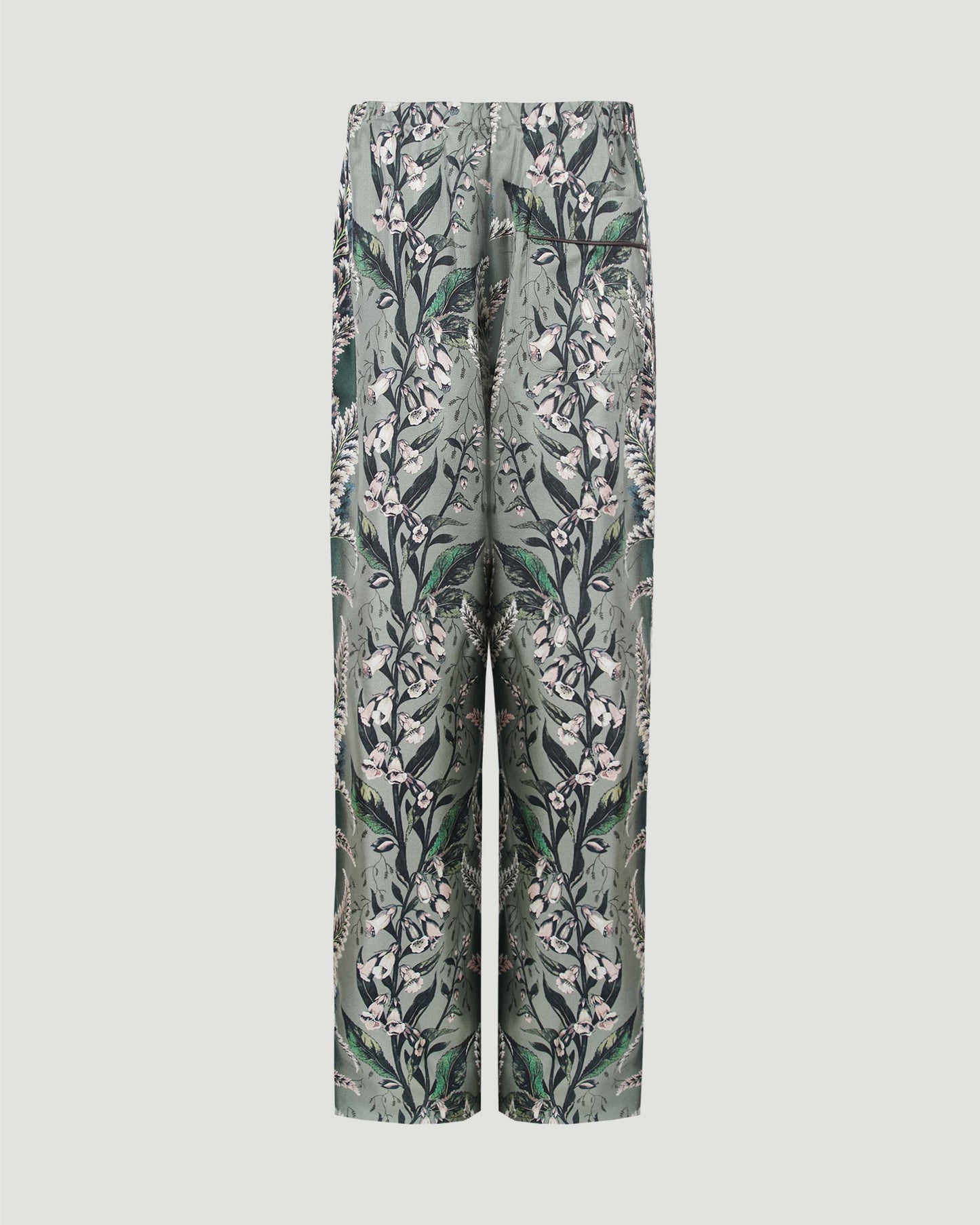 Silk pants with floral motif in green