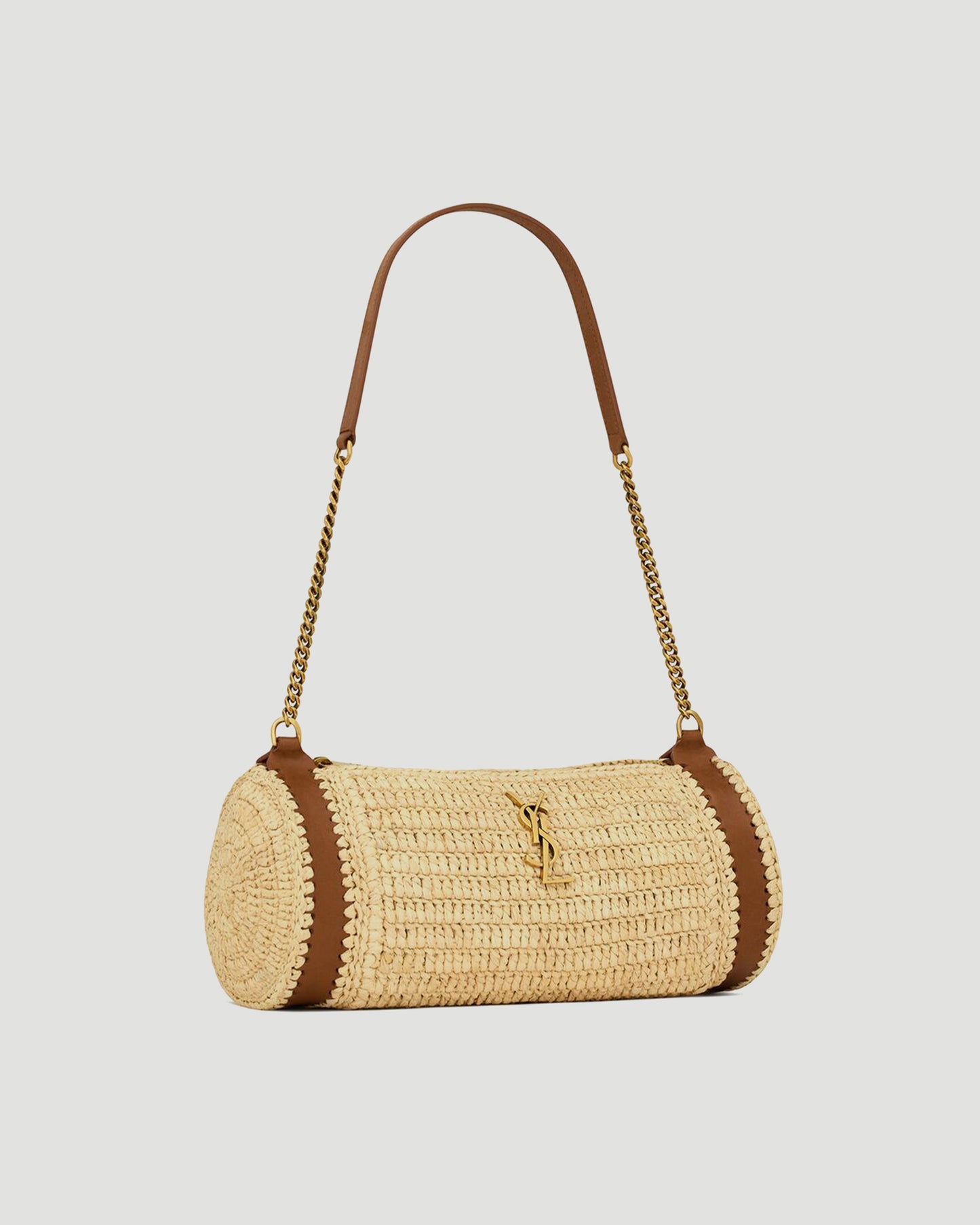 CASSANDRE SMALL CYLINDRIC BAG IN RAFFIA AND VEGETABLE-TANNED LEATHER