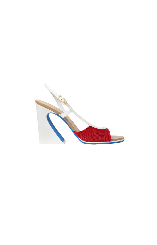 Red high-heeled shoe with a white wedge sole on a white background