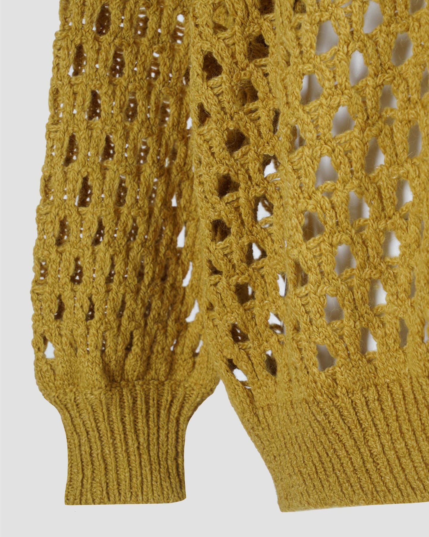 Perforated drop-shoulder jumper