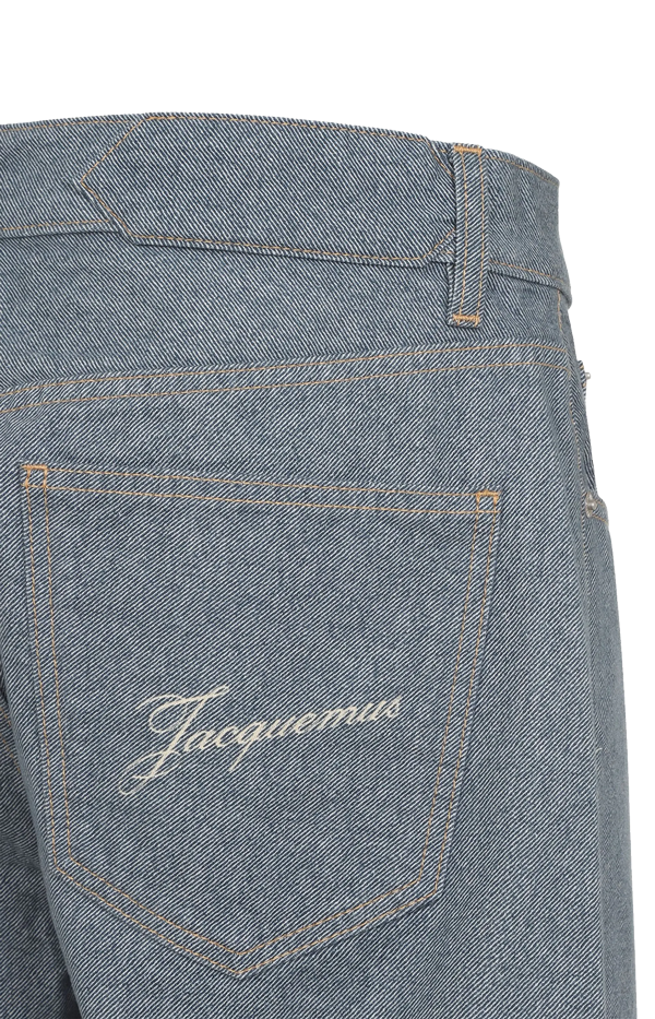 Nîmes embroidered-pocket jeans