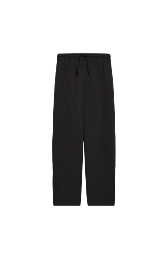 Black drawstring trousers in wool
