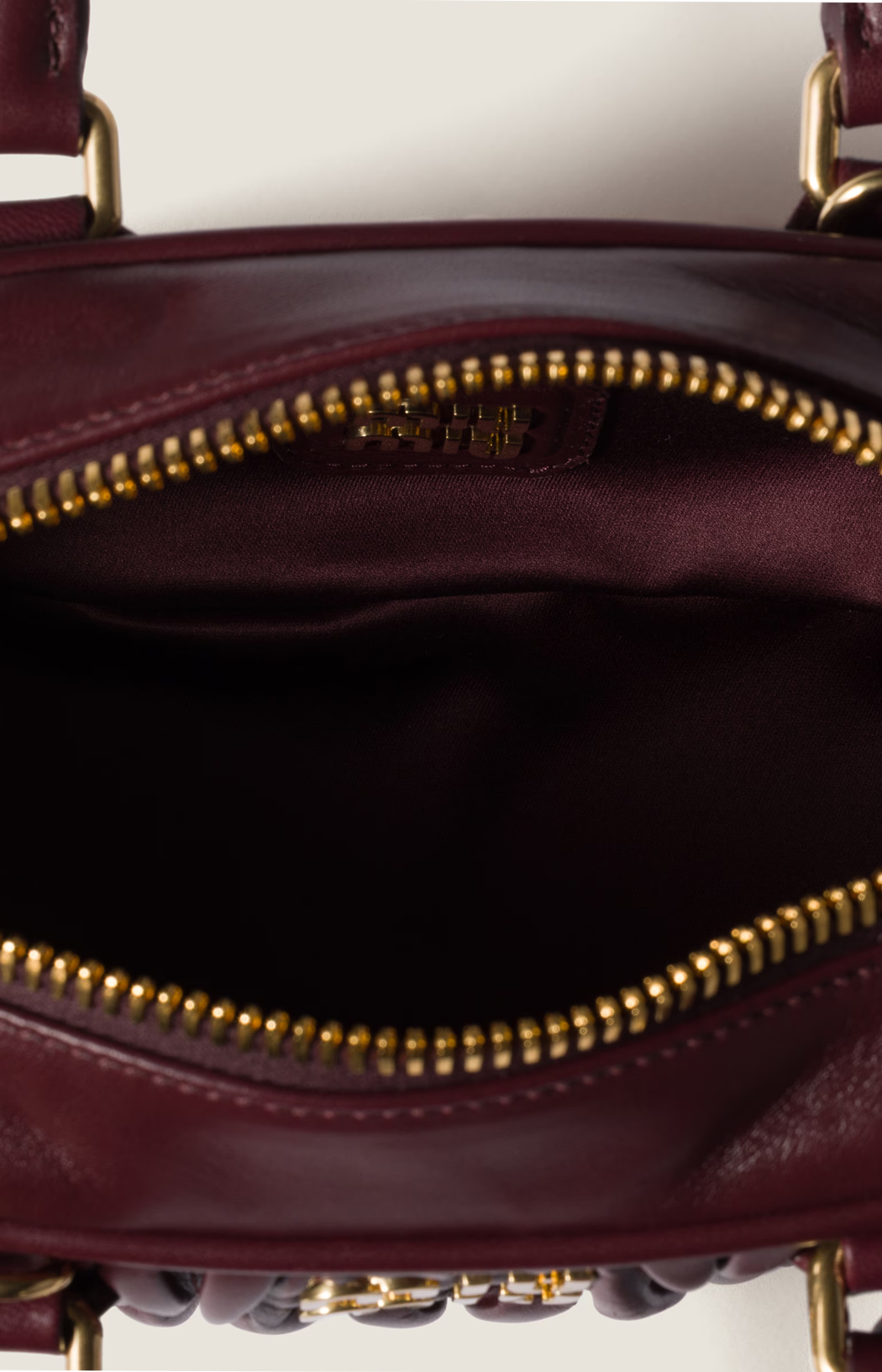Arcadie Matelassé Nappa Leather Bag in Burgundy
