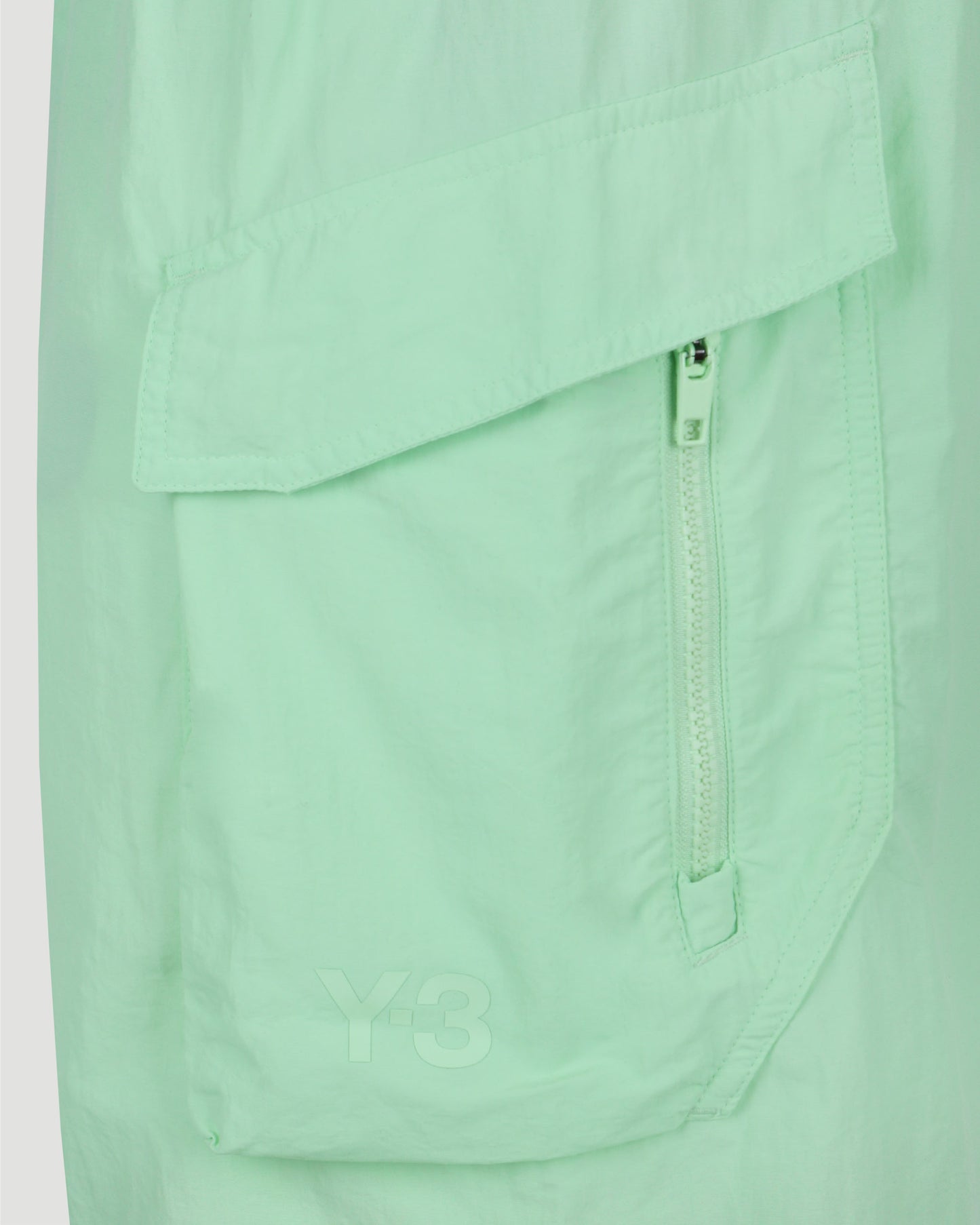 SWIM SHORTS IN GLOW GREEN