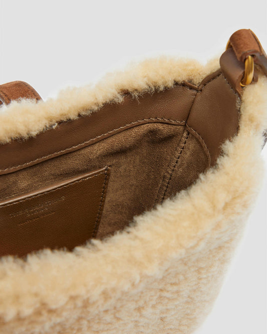 Le 5 à 7 vertical bag in beige shearling