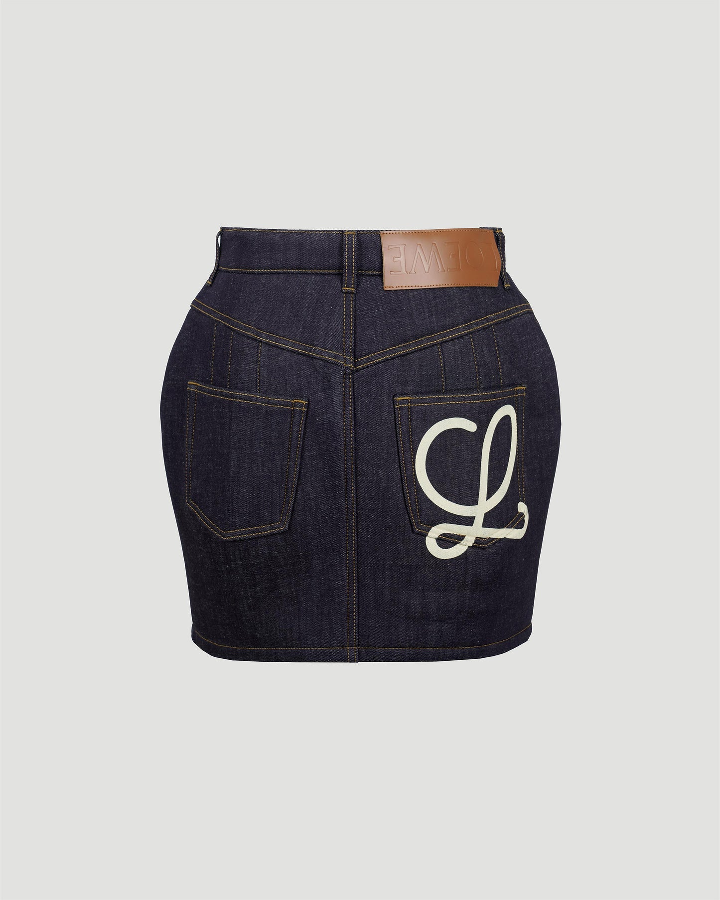 Curved mini skirt in denim